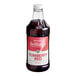 Monin Brilliance Yumberry Red Energy Concentrate in a bottle with a red label and white cap.