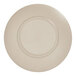 A taupe Cal-Mil melamine bowl with a circular pattern on the inside.