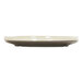 A white Cal-Mil melamine plate with a brown rim.