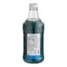 A case of Monin Brilliance Berry Blue Energy Concentrate with a bottle of blue liquid.