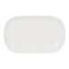 A white oval Cal-Mil melamine plate with a raised rim.