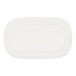 A white oval Cal-Mil melamine plate with a raised rim.