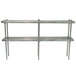 A stainless steel Advance Tabco table mounted double deck shelving unit with a long metal rod on the back.