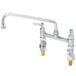 A chrome T&S deck-mounted faucet with two lever handles.