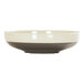A Cal-Mil Vienna melamine bowl with a white and brown rim.