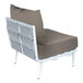 A BFM Seating Cayman white outdoor middle section chair with a grey Sunbrella cushion and back pillow.