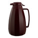 A burgundy ABS plastic coffee carafe with a handle.