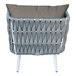 A white outdoor armchair with grey rope and a charcoal cushion and back pillow.