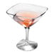 A Solia clear plastic mini martini cup filled with a pink drink.