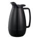 A black Service Ideas Thermo-Serv coffee carafe with a handle.