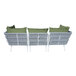 A white outdoor BFM Seating Cayman sofa with green Sunbrella cushions and 5 back pillows.