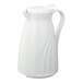 A white pitcher with a handle and push-button lid.