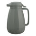 A grey plastic Service Ideas coffee carafe with a handle and lid.