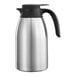 A stainless steel Service Ideas coffee carafe with a black handle.