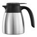 A stainless steel Service Ideas coffee carafe with a black handle.