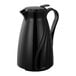 A black plastic coffee carafe with a handle.