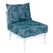 A white BFM Seating Cayman outdoor couch middle section with a Sunbrella blue and white cushion and back pillow.