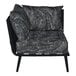 A BFM Seating Cayman outdoor corner chair in black with black Sunbrella cushions and pillows.