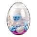 A Solia clear plastic egg shaped container filled with candy.