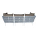 A white outdoor BFM Seating wicker couch with Sunbrella Charcoal cushions and pillows.