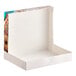 A multicolor box with a picture of donuts and the word "Delicious" on it.