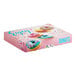A multicolor Southern Champion donut box with a picture of blue donuts with sprinkles.