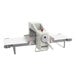 A white and silver Rondo Countertop Dough Sheeter with a handle.