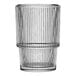 An Anchor Hocking stackable beverage glass with lines on the rim.