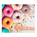 A group of donuts in a "Delicious" multicolor box with a window.