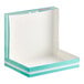 A white rectangular box with a white lid and multicolor "Tasty" lettering on the sides.