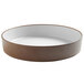 A brown and white Cal-Mil stoneware plate with a raised white rim.