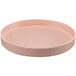 A round pink Cal-Mil Hudson melamine plate with a raised rim.