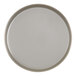 A round white plate with a grey raised rim.