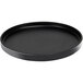 A black round Cal-Mil low rim melamine plate on a counter.