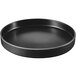 A black Cal-Mil raised rim melamine plate with a silver rim.
