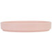 A close-up of a Cal-Mil blush low rim melamine plate with a flat bottom in pink.
