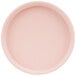 A close-up of a Cal-Mil Hudson blush melamine plate with a low rim.