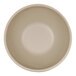A close up of a taupe Cal-Mil melamine soup bowl with a shadow on a white background.