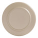 A taupe plate with a round edge and white rim.