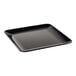 A black square Tablecraft Sierra Collection melamine serving platter with a curved edge.