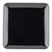A black square melamine serving platter with a white border.
