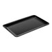 A Tablecraft black rectangular melamine tray.