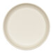 An ivory melamine bowl with a round rim on a white surface.