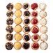 A group of mini assorted cheesecakes on a square platter.
