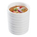 A Solia white porcelain mini dish filled with food.
