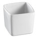 A close-up of a white square Solia porcelain mini dish.