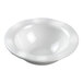 A close-up of a white Solia porcelain mini dish with a white rim.