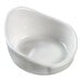 A Solia white porcelain mini dish with a small hole in the bottom.