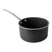 A black saucepan with a silver handle.