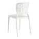 A white resin side chair with a webbed back design.